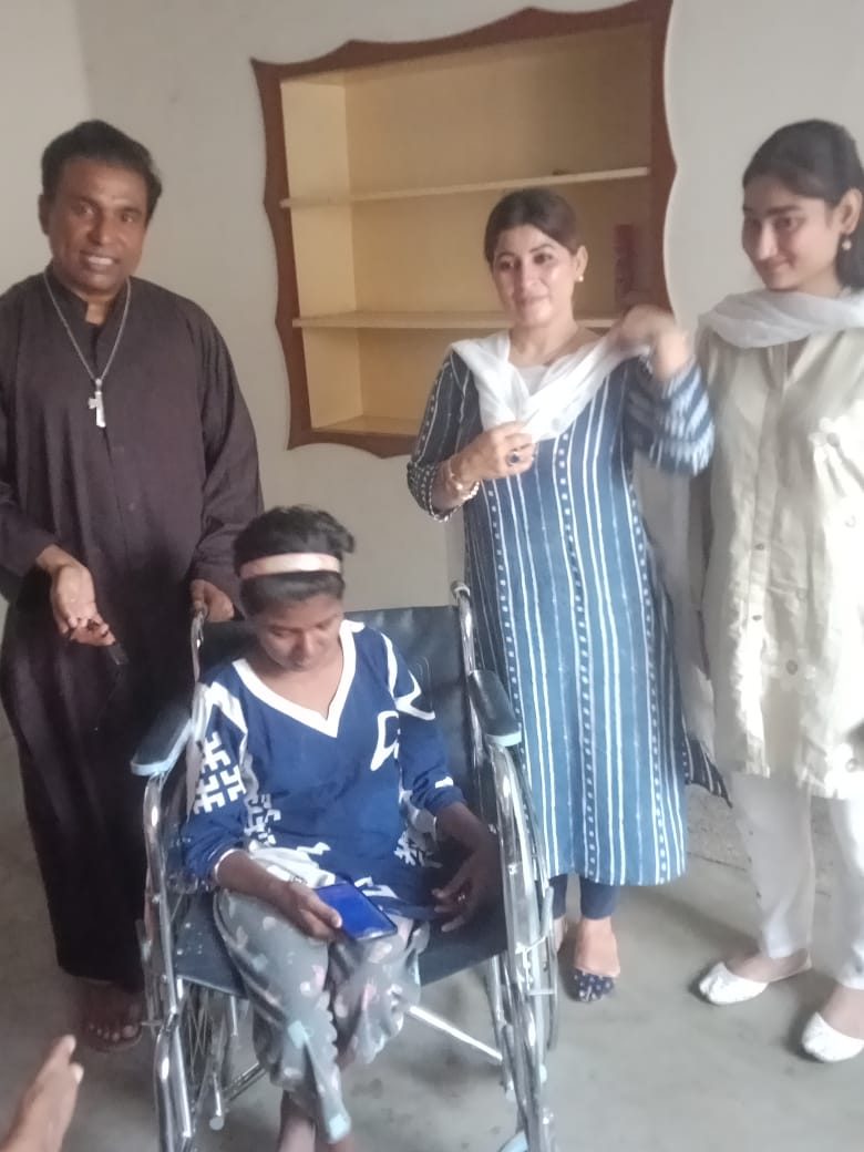 Caregiver feeding an elderly resident